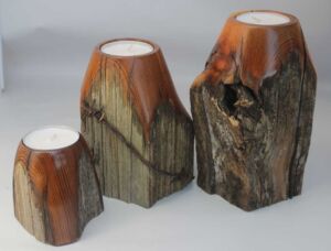 Part of Western Heritage Series Woodturned, trio of XL tealight candleholders, made from historic cedar fenceposts; range from about 6-9"; finished with Minwax