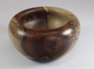 Part of Gratitude Series Woodturned, palm-sized gratitude bowl made from walnut; 4.75"x2.5" with Tung oil finish